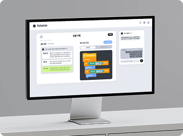 RoboLab experiment details displayed on a desktop monitor
