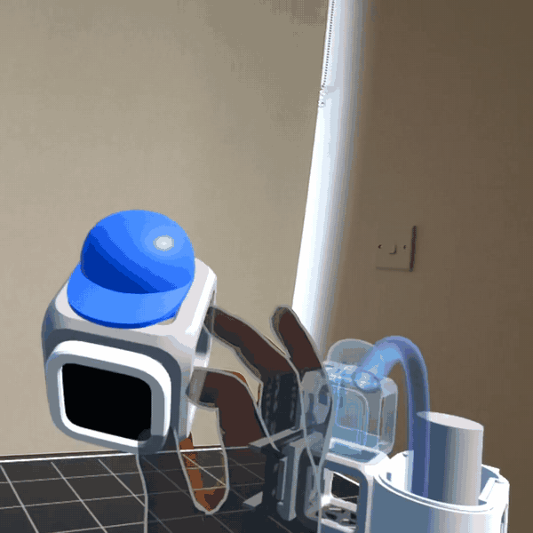 A student assembling Kobi and the watering robot with hand tracking in mixed reality